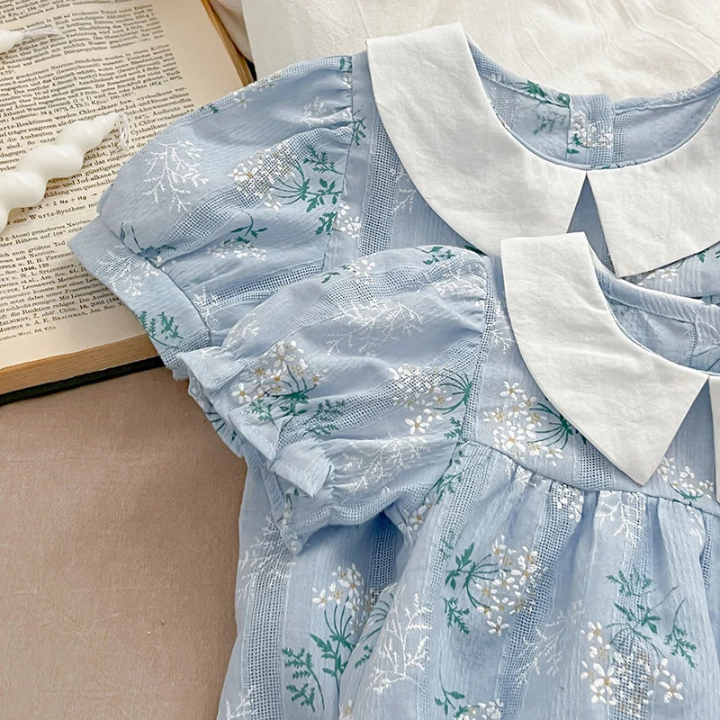 Eloise Baby Blue Floral Onesie - Peachy Bloomers