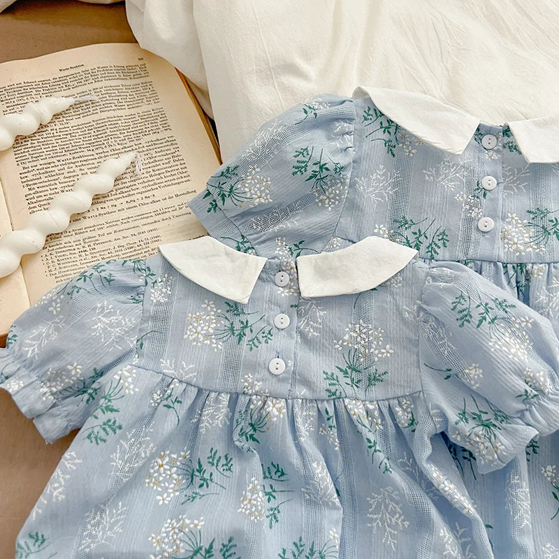 Eloise Baby Blue Floral Onesie - Peachy Bloomers